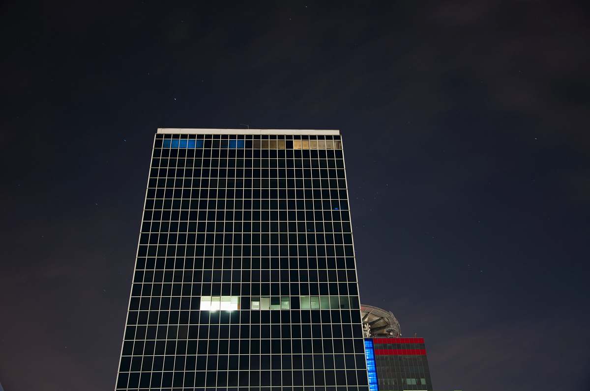 brescia low-angle photo of high-rise building during night time italy