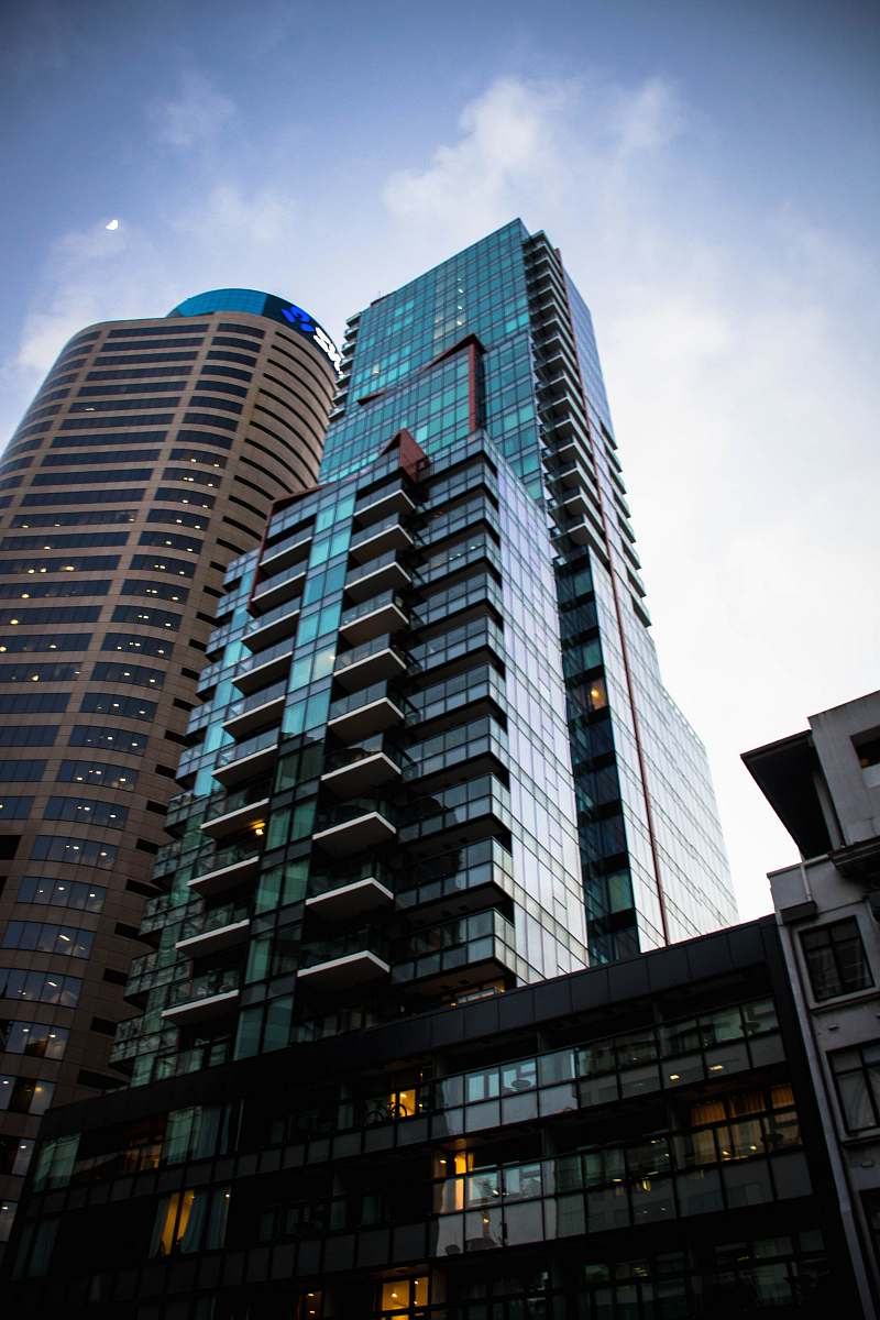 condo low-angle photograph of concrete structure housing