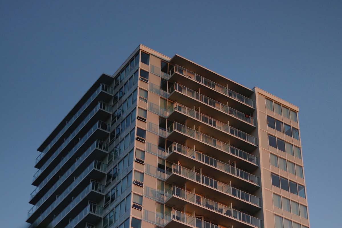condo low angle photography of building housing