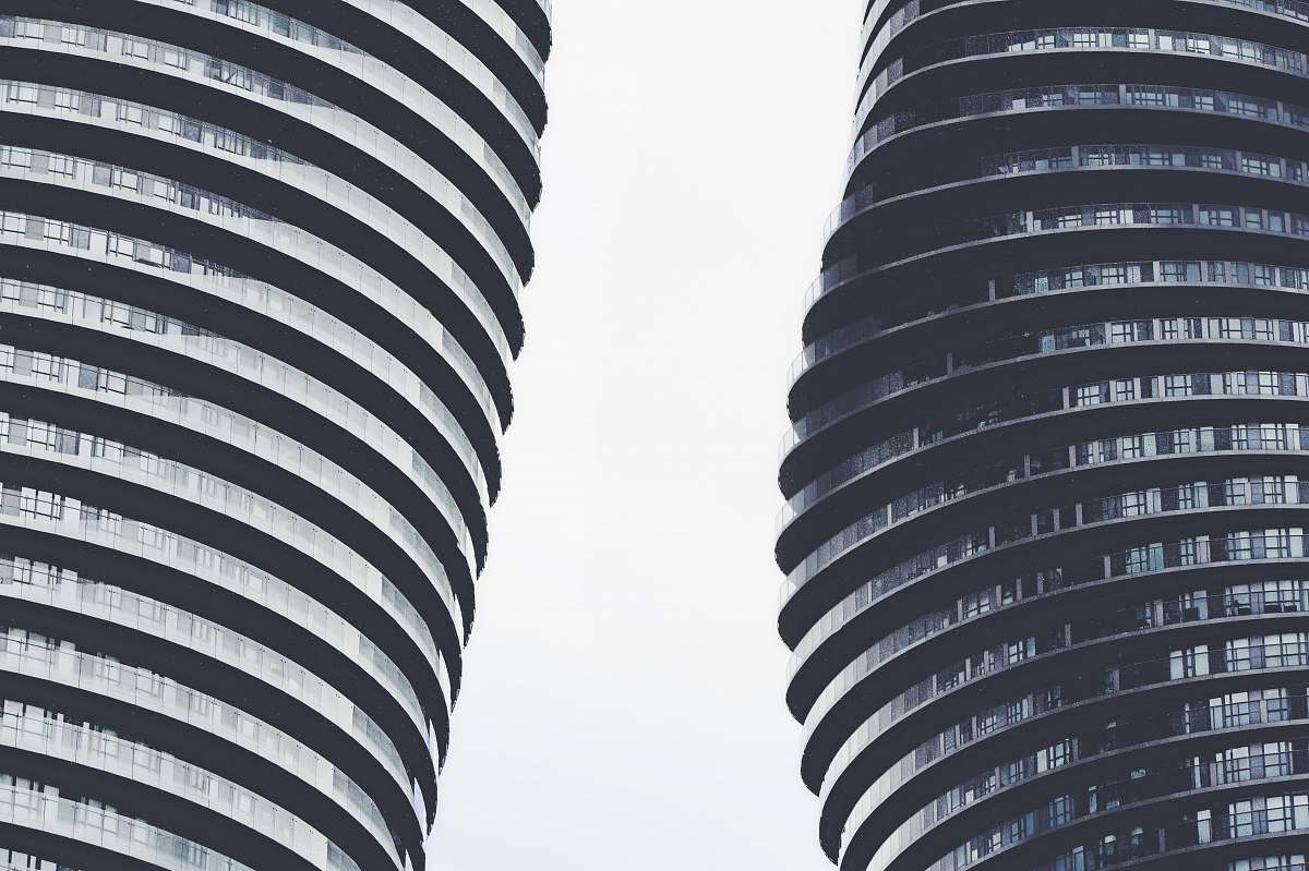 skyscraper low angle photography of curtain building architecture