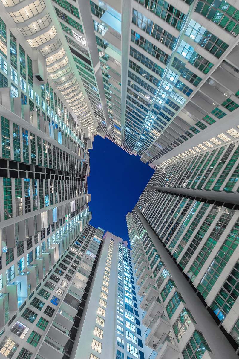 city low angle photography of glass curtain buildings office building