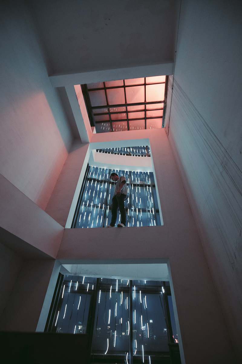 architecture man wearing white top window