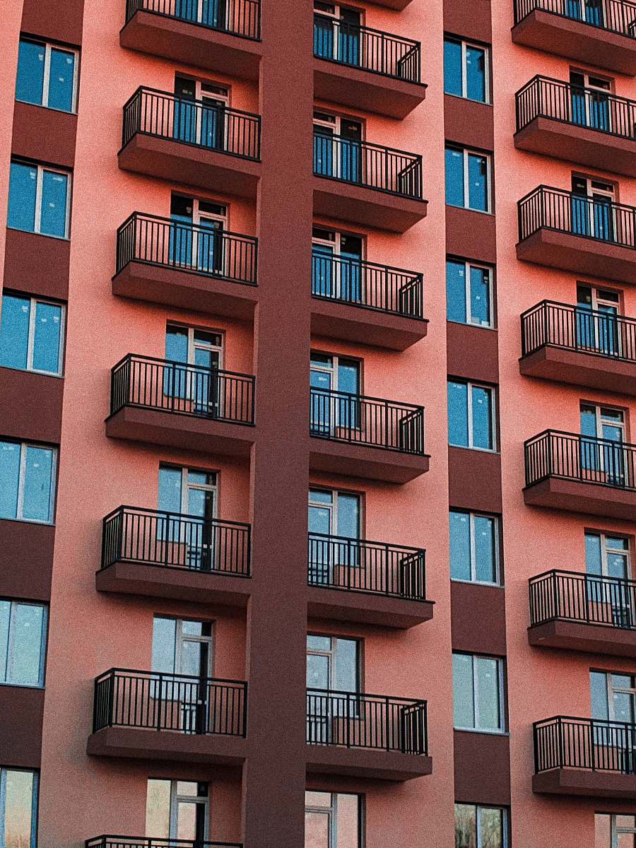 city maroon and brown painted building town