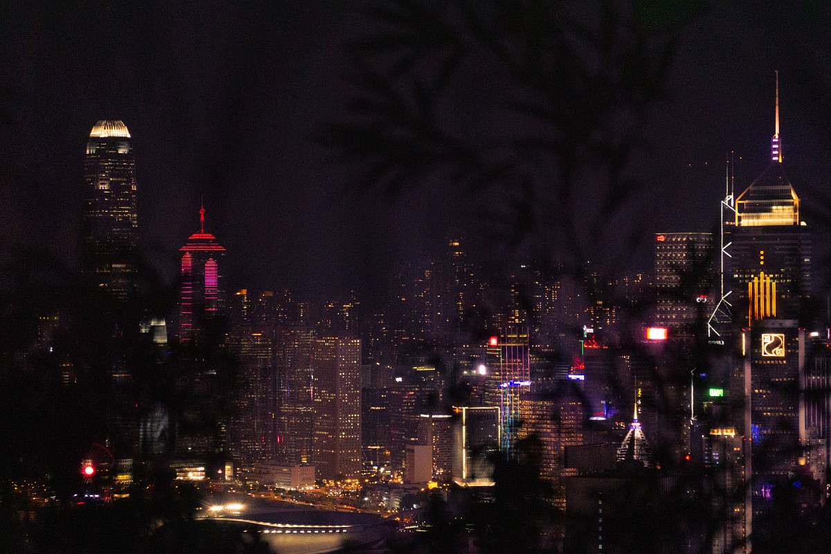 city photo of high-rise buildings at night metropolis
