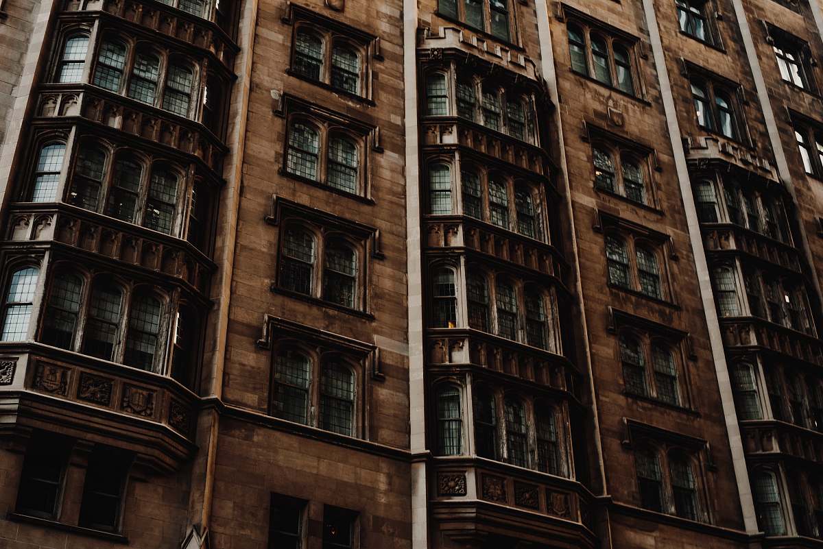 housing structure photography of brown concrete building city