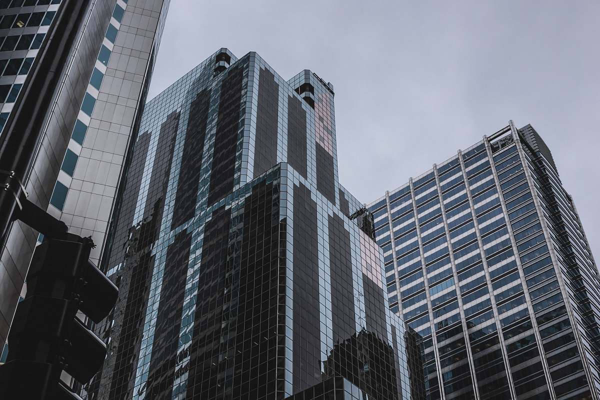 architecture three tall buildings during daytime skyscraper