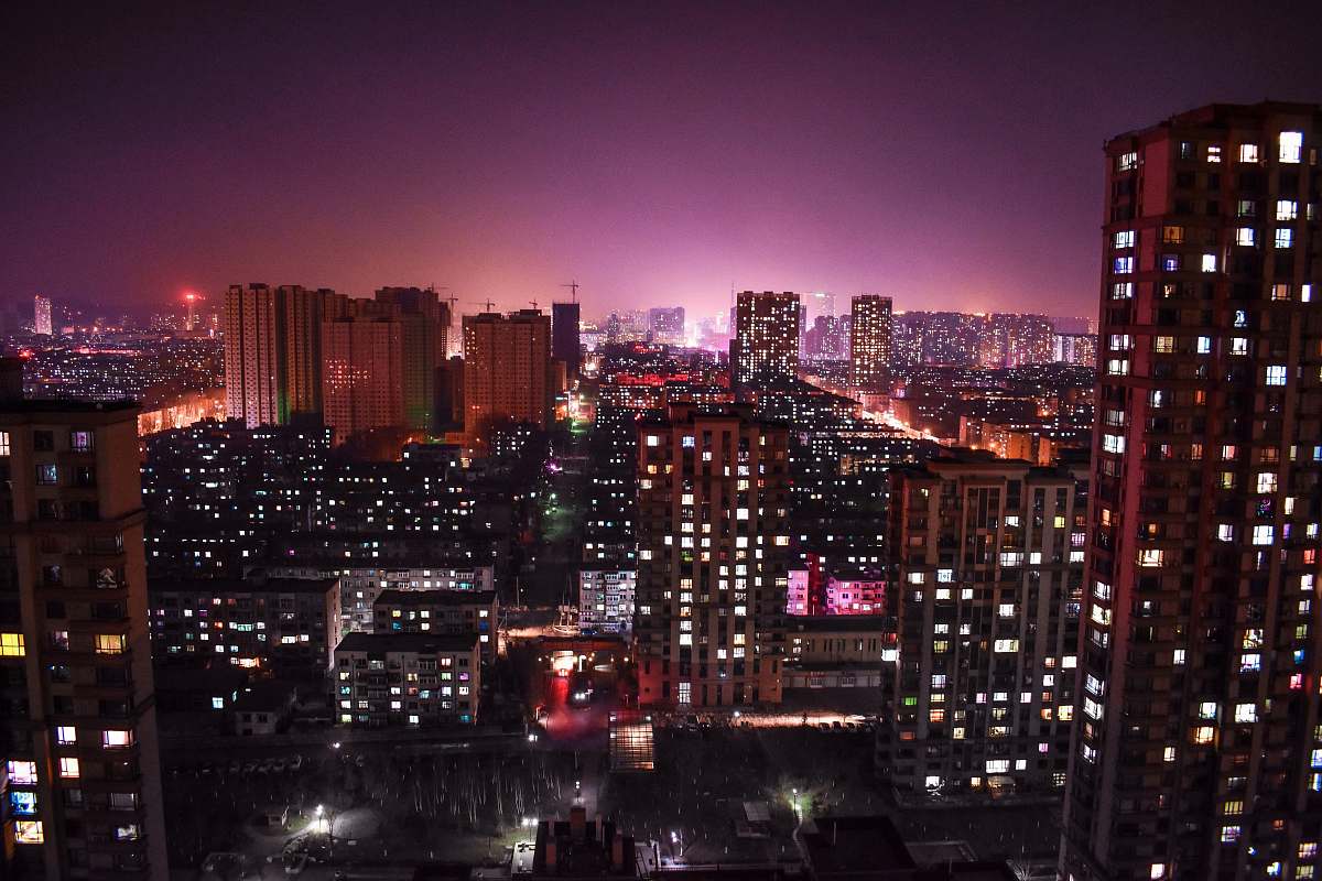 city top view of high rise buildings during nighttie urban