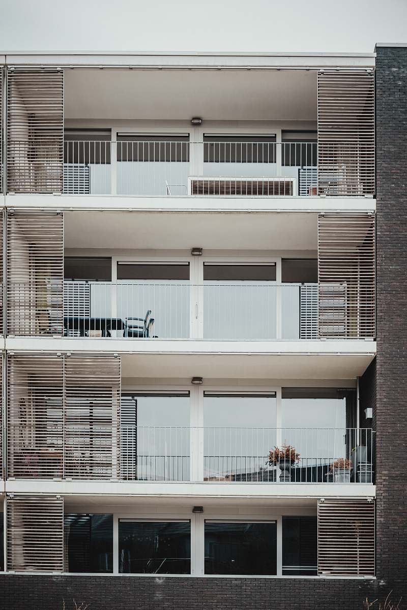 city white concrete 4-story house grey