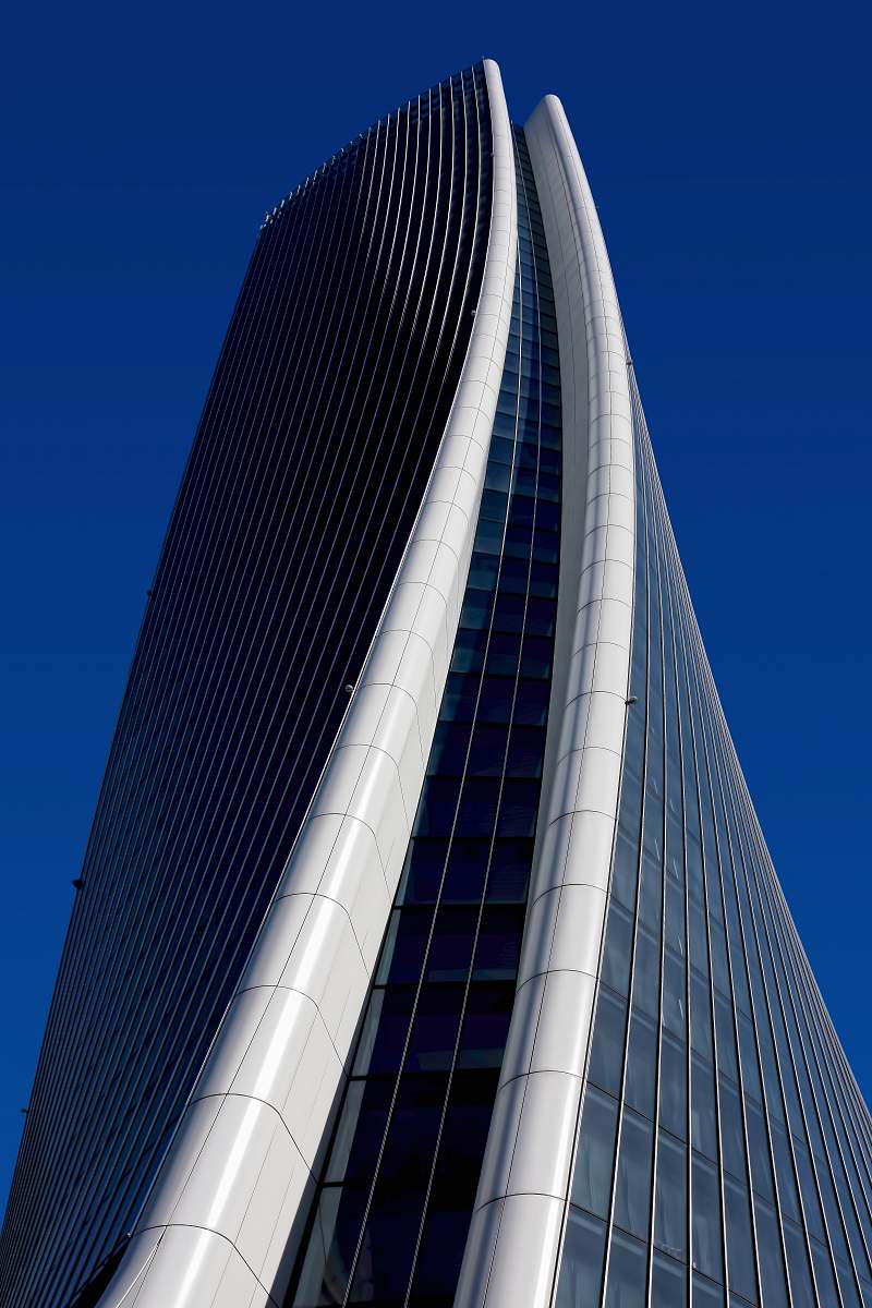 architecture white concrete and metal high rise building during daytime skyscraper