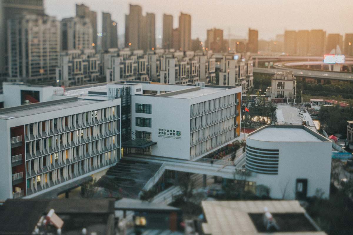 city white concrete buildings during daytime high rise