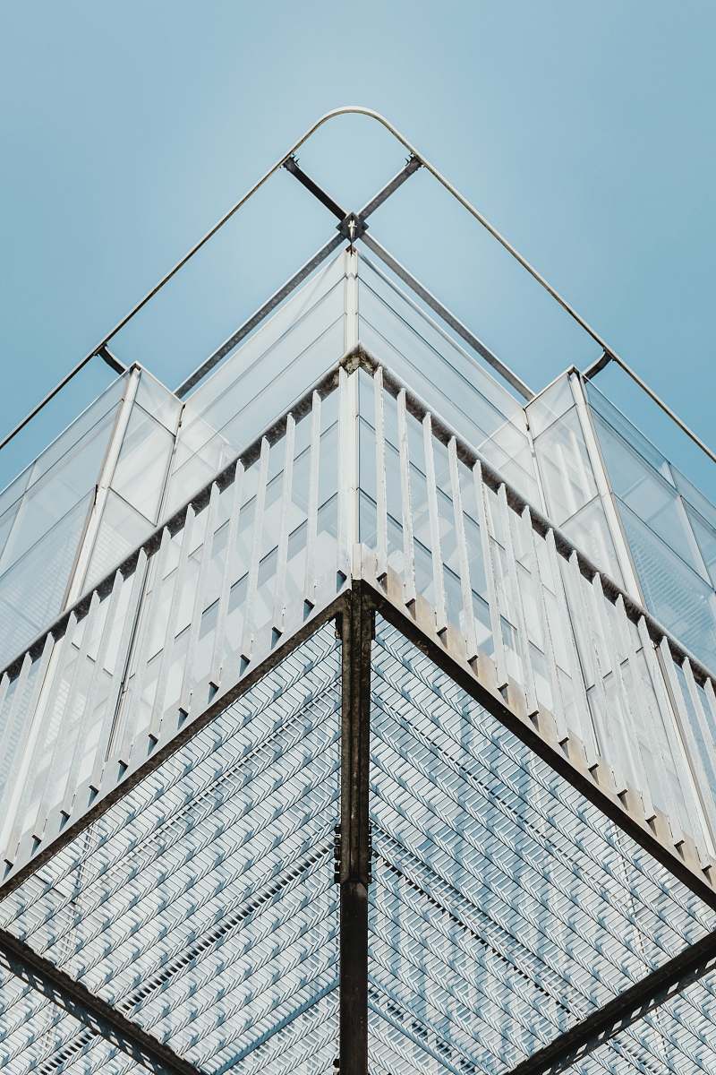 belgium white high-rise building with blue sky louvain-la-neuve