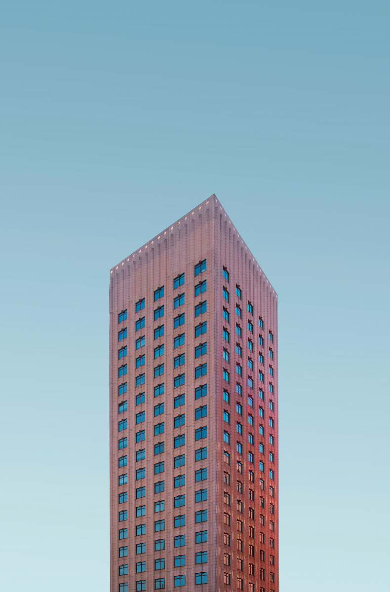city worms eye view of brown concrete building urban