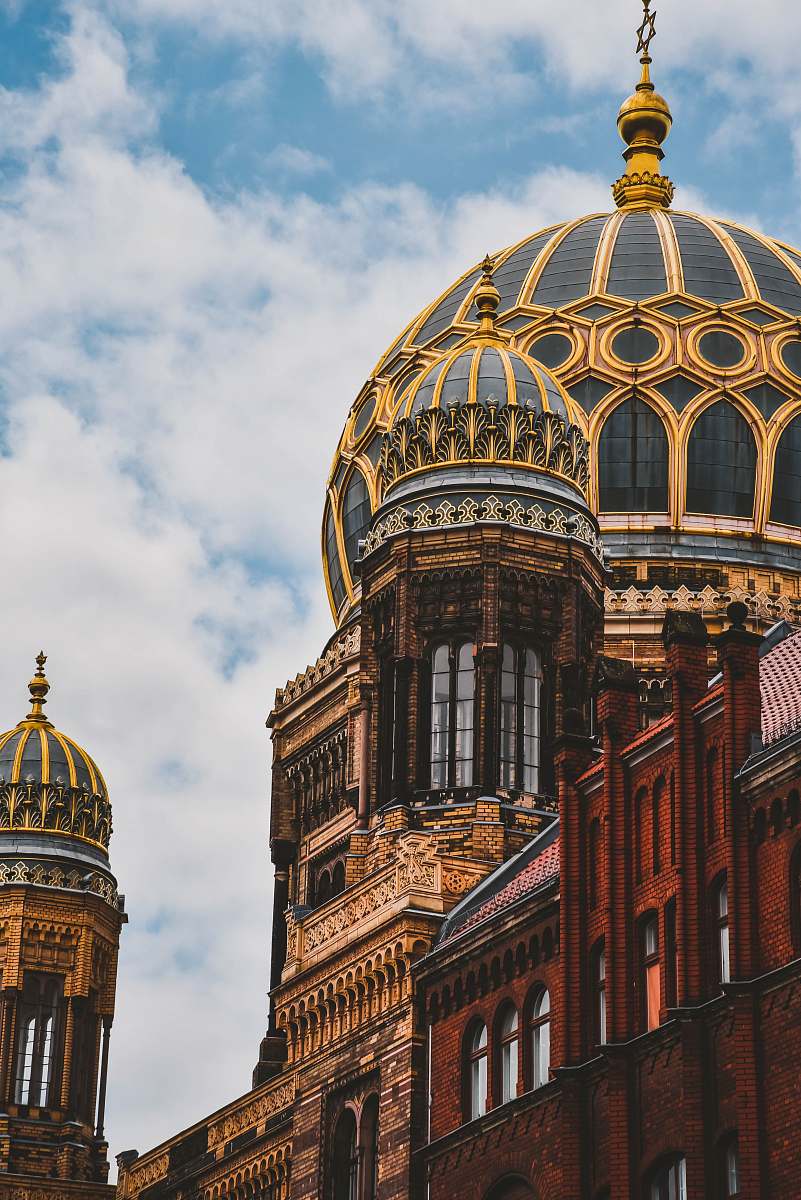 architecture yellow and black domed building during daytime dome
