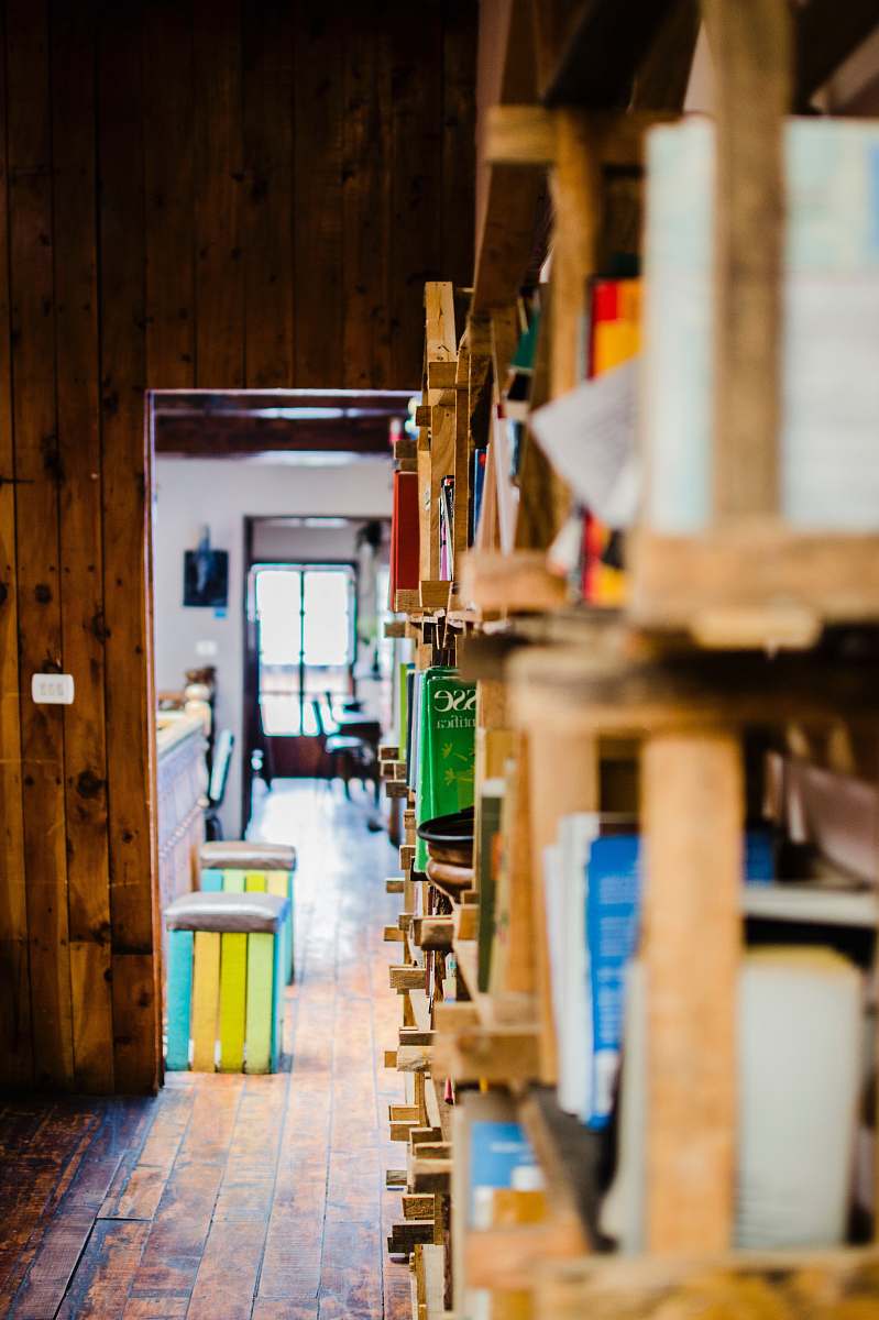 books brown wooden rack in shallow photography book