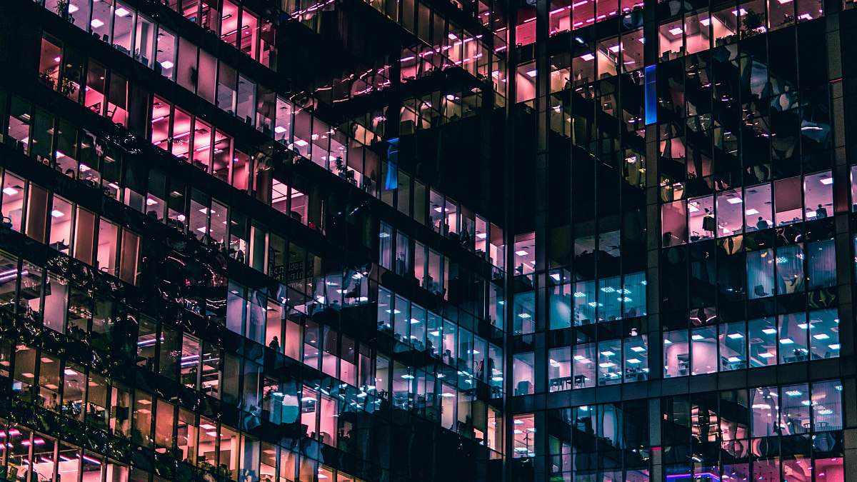 building architectural photography of building with people in it during nighttime window