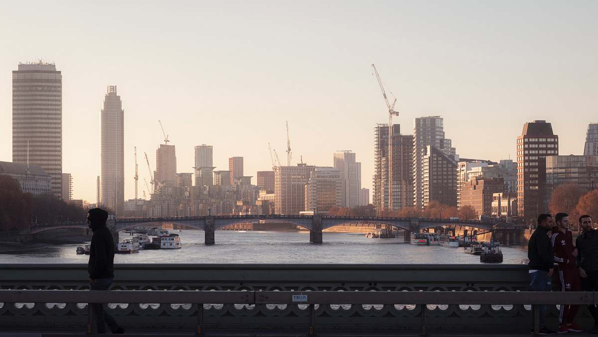 human cityscape during daytime person