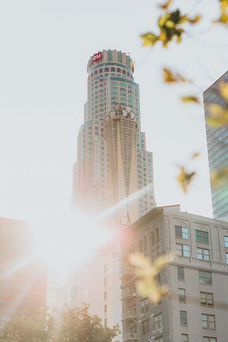 building golden hour photography of high-rise building demolition