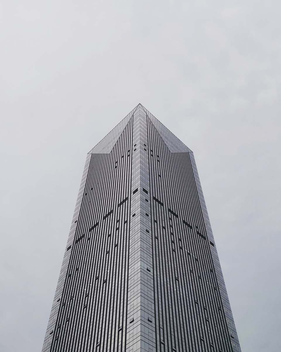 building low angle photography of building structure grey
