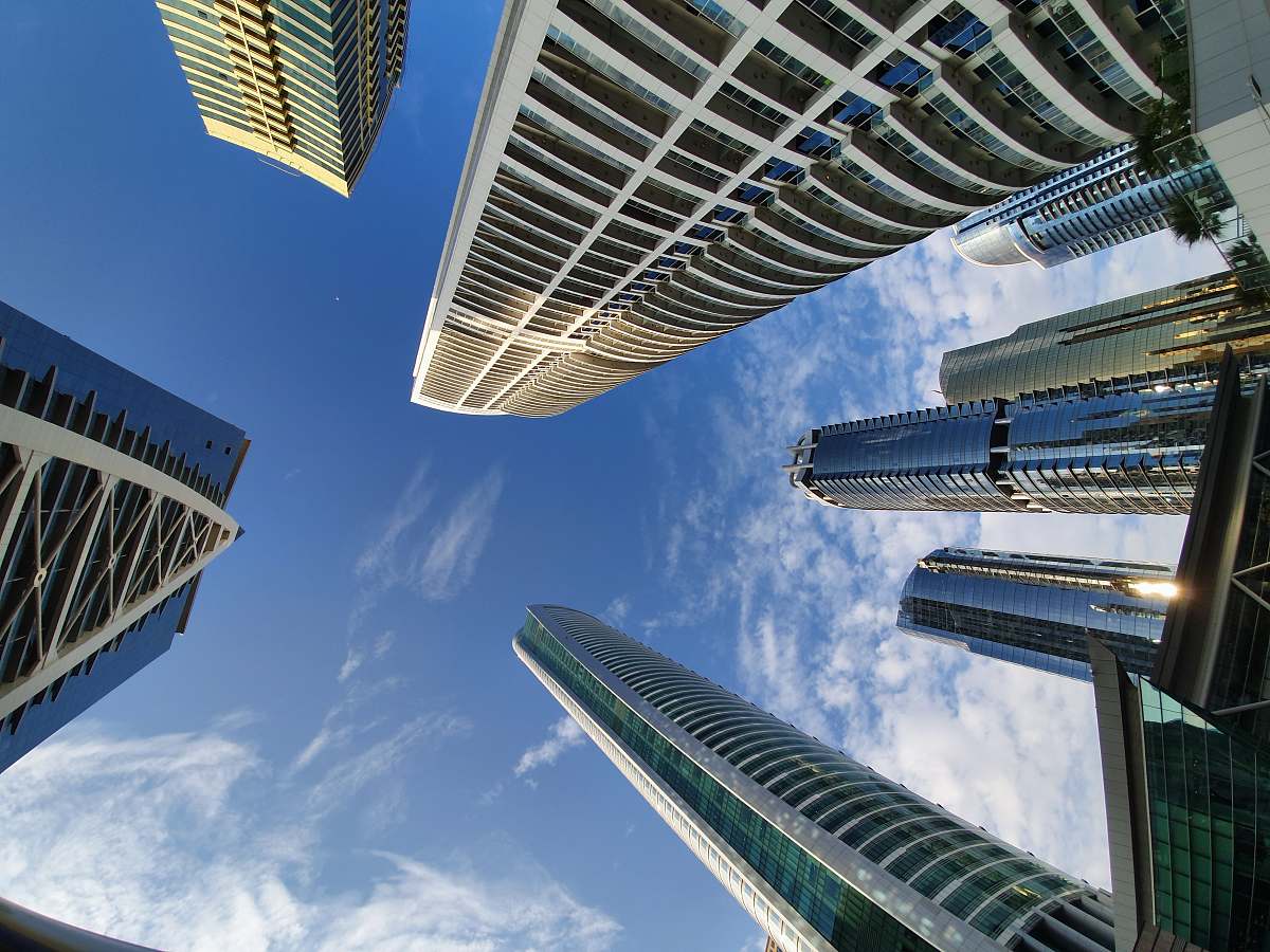 building low-angle photography of high rise buildings high rise