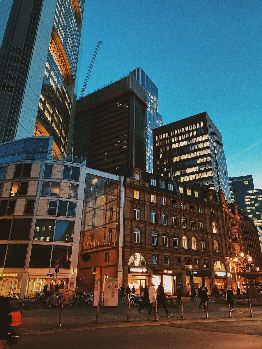 building people beside building downtown