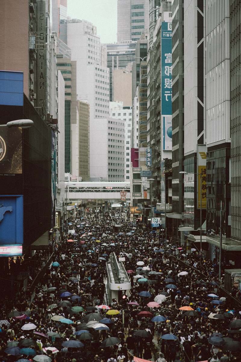 urban people walking on paved road metropolis