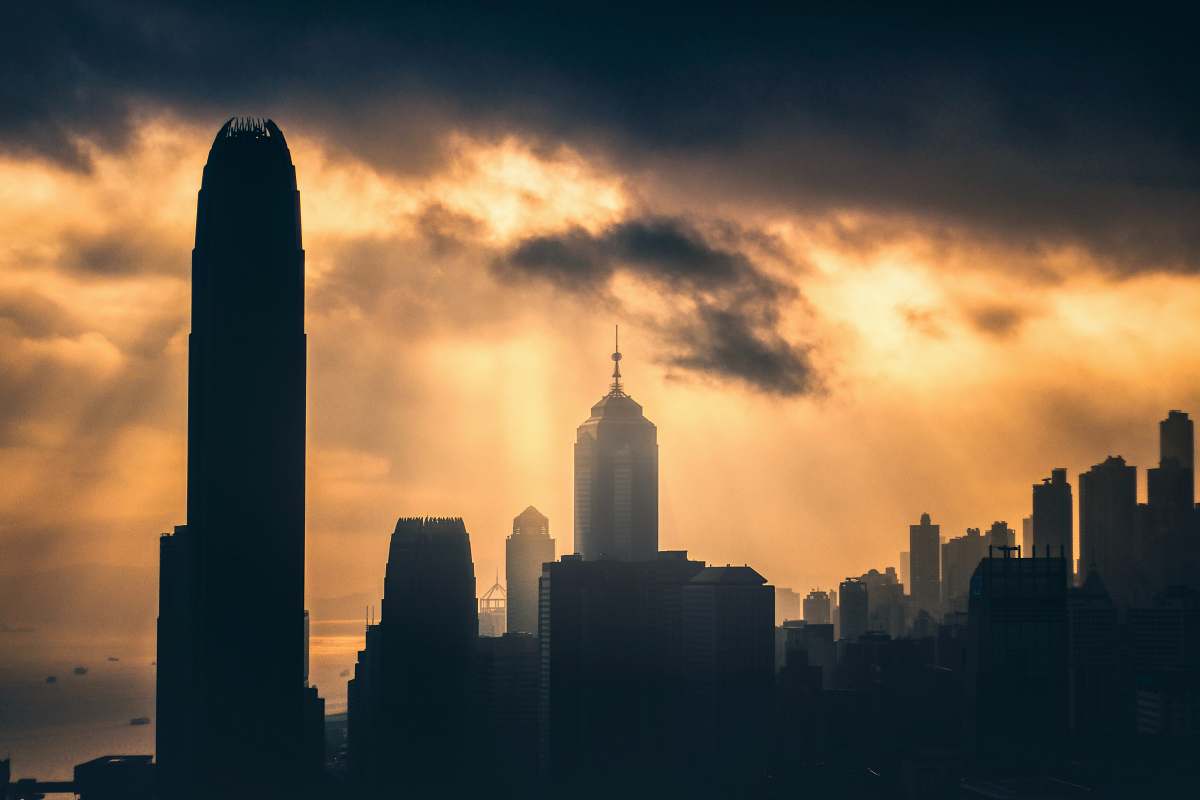 building silhouette photography of high-rise buildings during golden hour silhouette