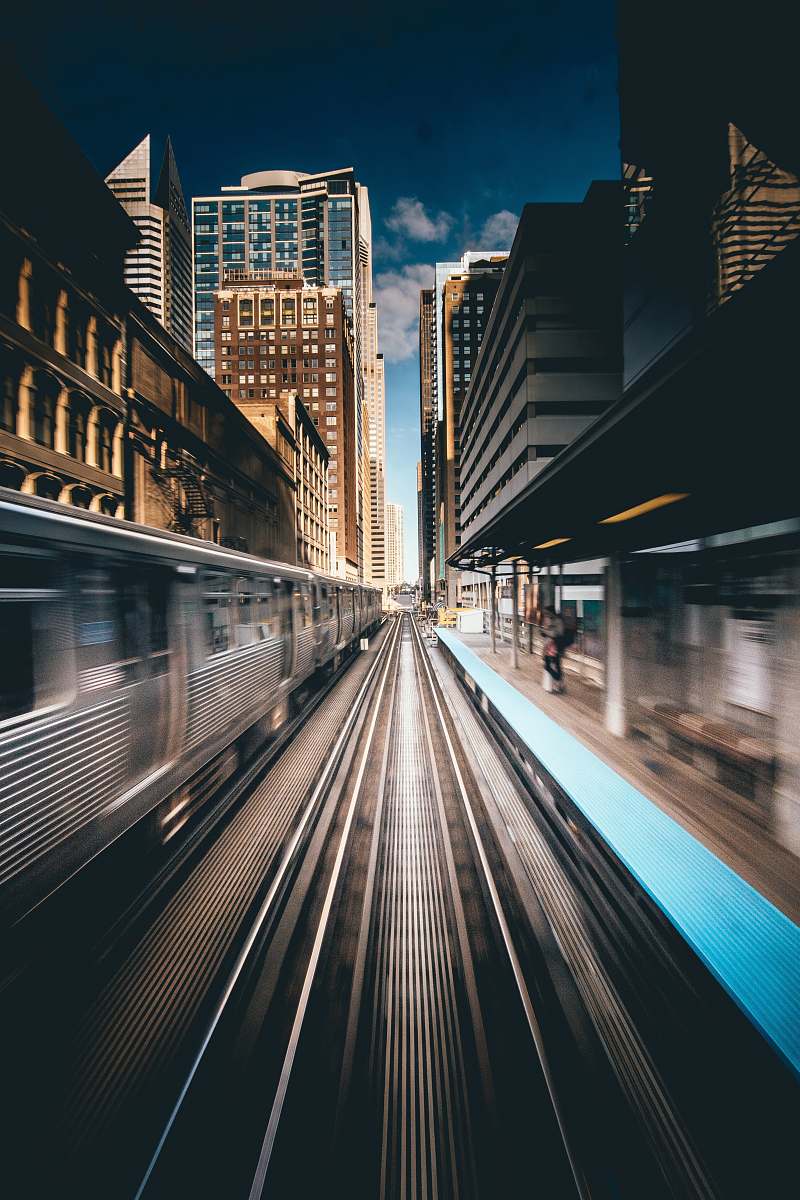 chicago time-lapse photography of train traveling urban
