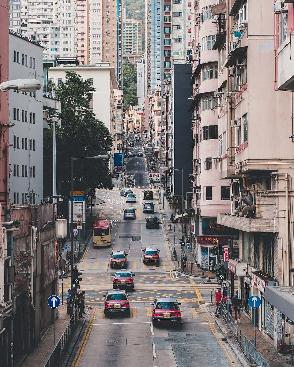 road vehicle running in road during daytime urban