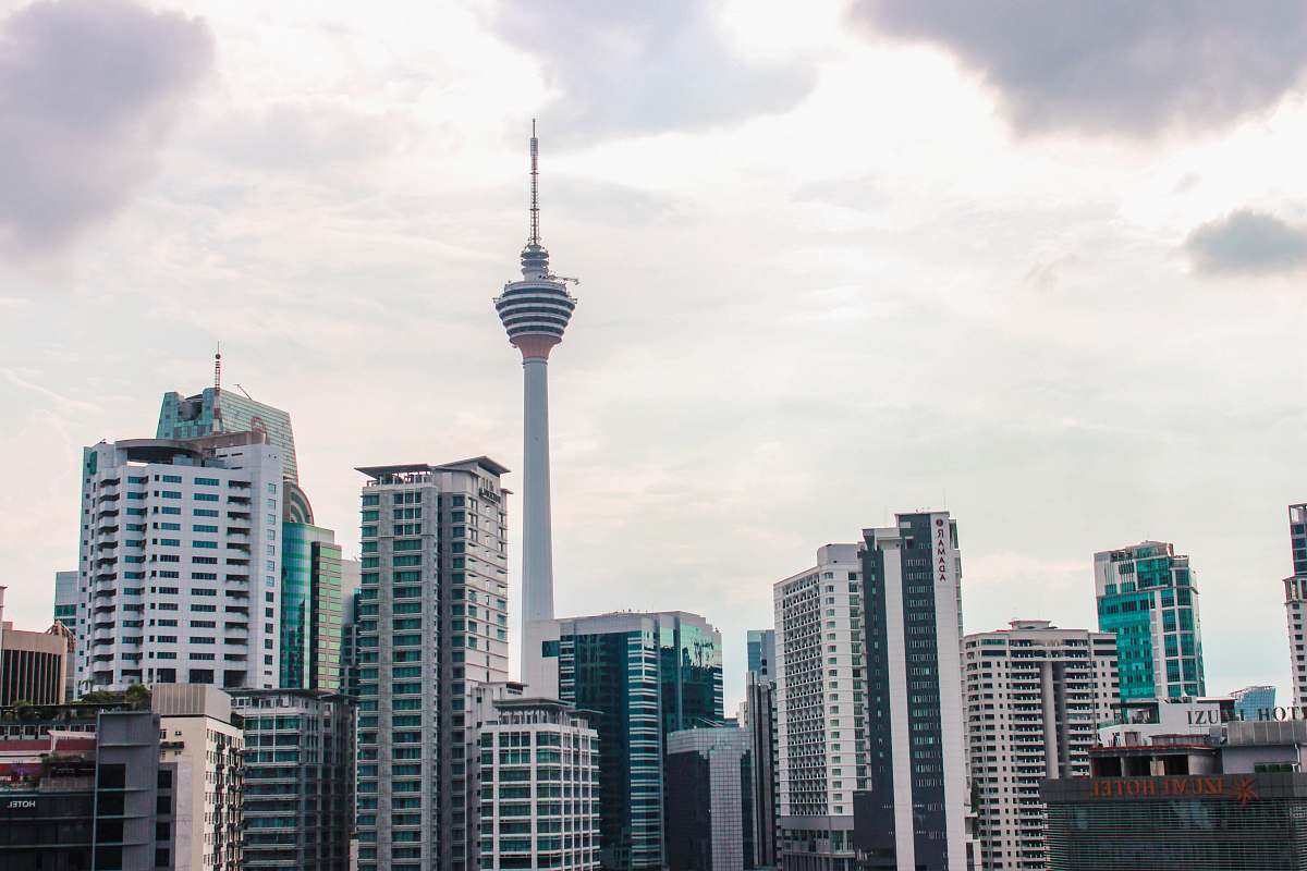 building white and blue high-rise building high rise
