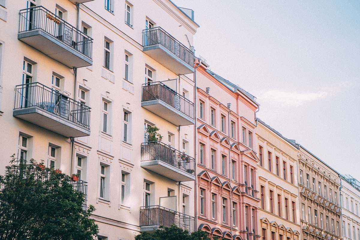 building white and pink buildings during daytime urban