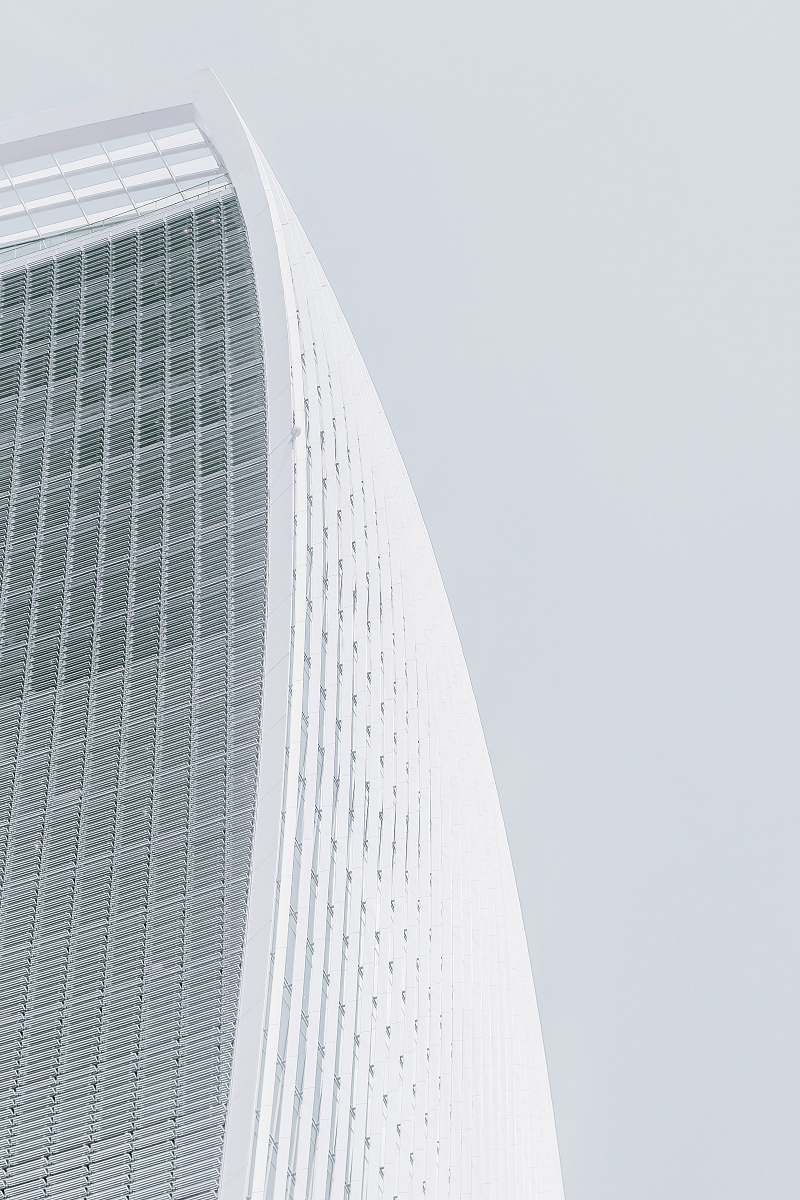 architecture white concrete multi-storey skyscraper at daytime grey