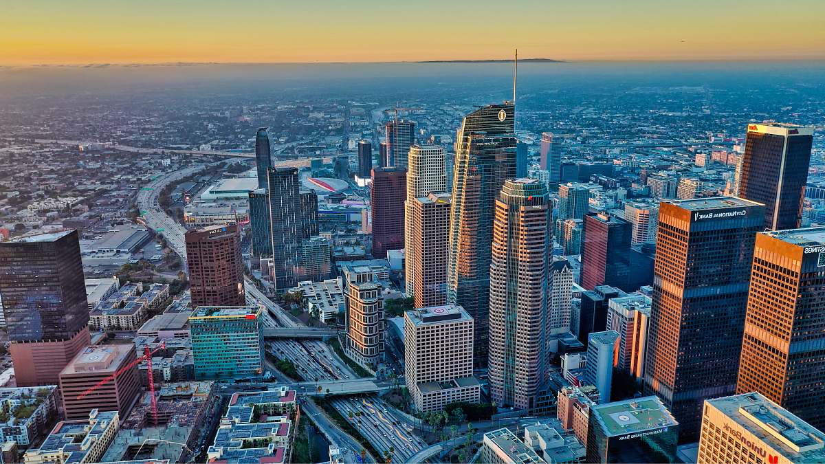 building wide-angle photography of high-rise buildings during daytime town