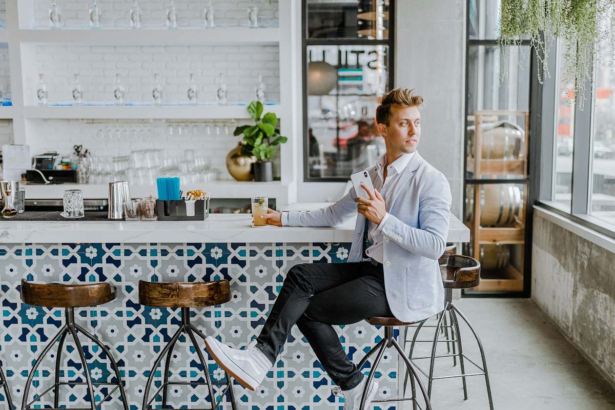 person man sitting on stool human