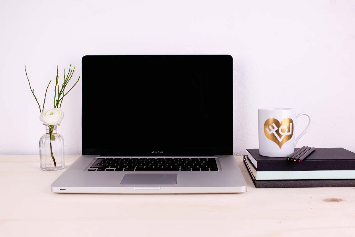 laptop gray and black laptop computer cup