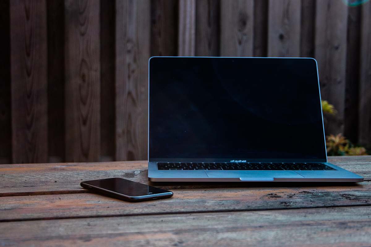 electronics MacBook Pro on tabl laptop