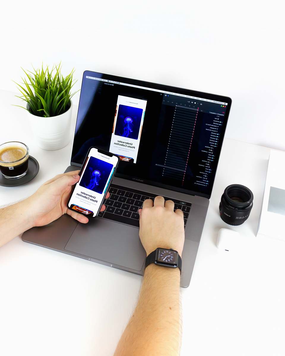 phone person holding black Android smartphone hardware