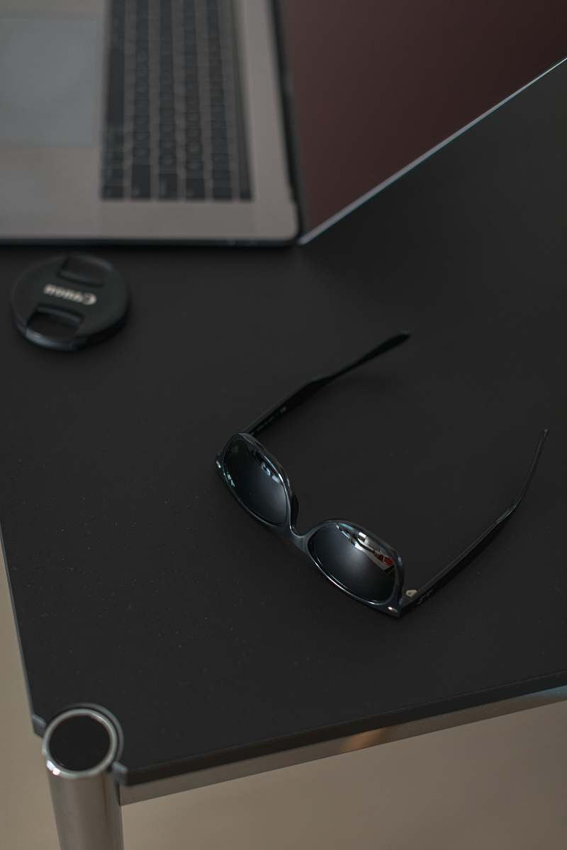 pc sunglasses on table computer