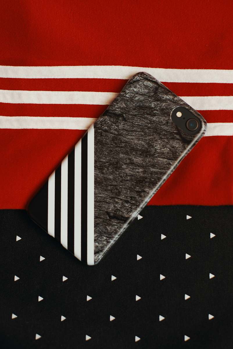 symbol black iPhone on red and white textile tie