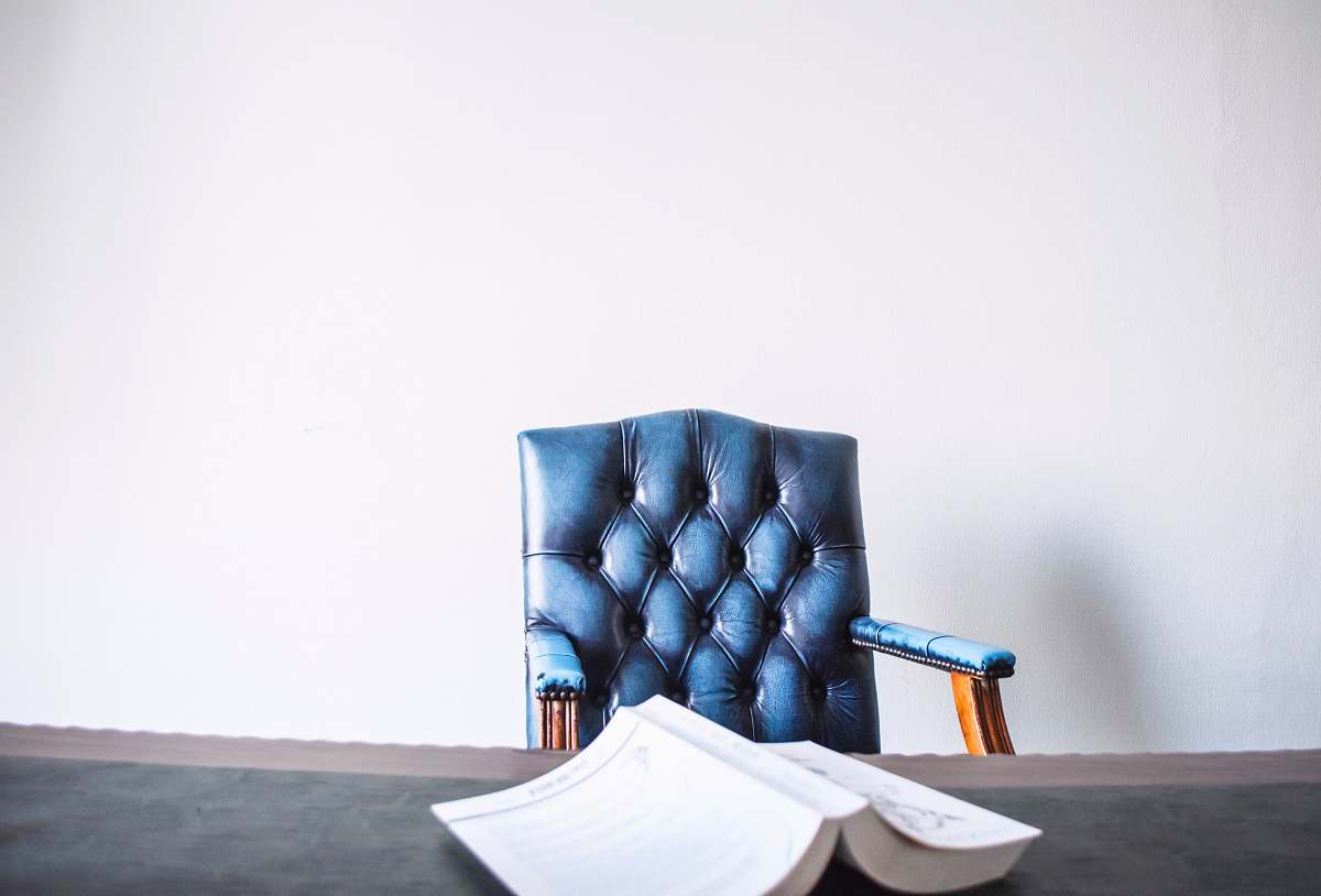 chair opened book on desk brussels