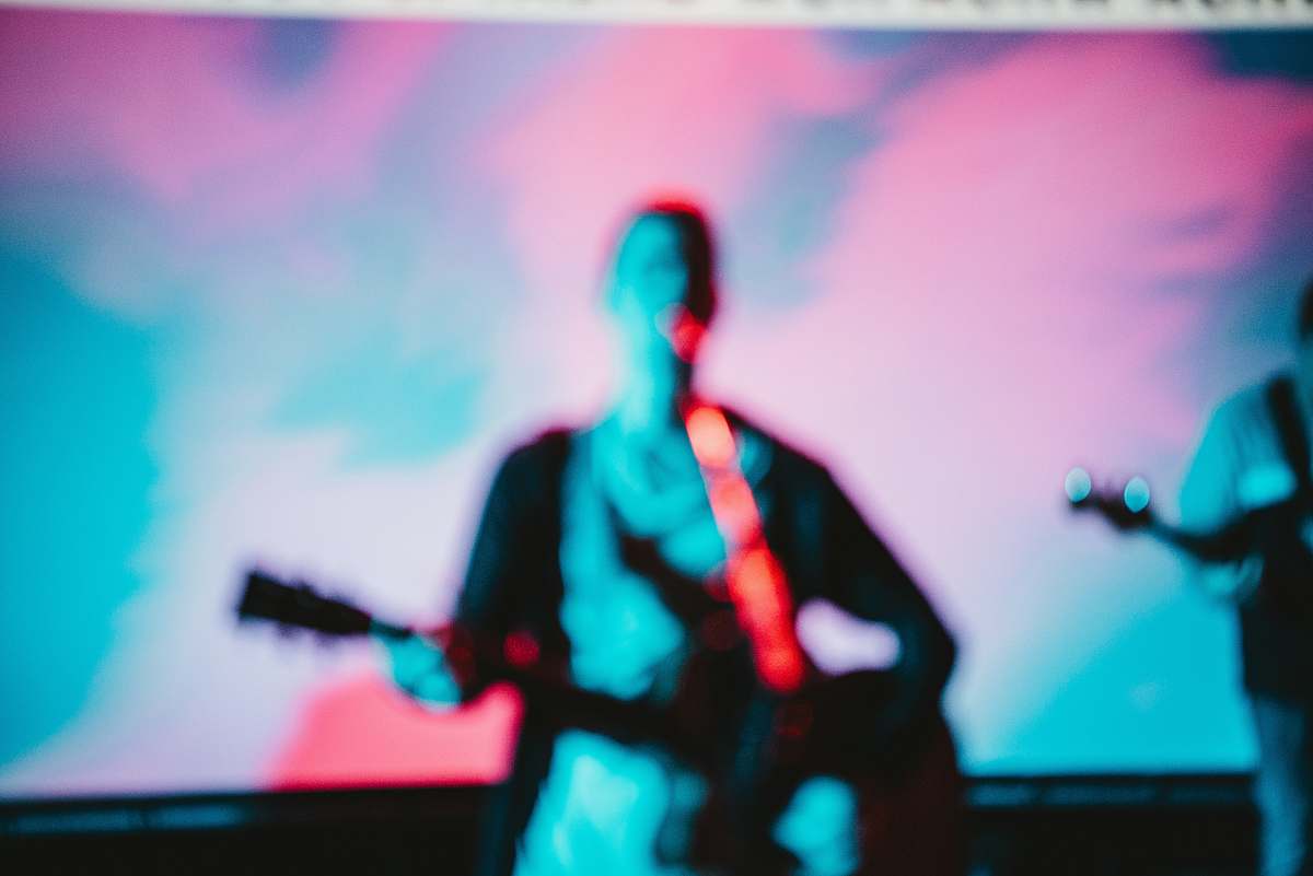 guy man playing guitar screengrab performer