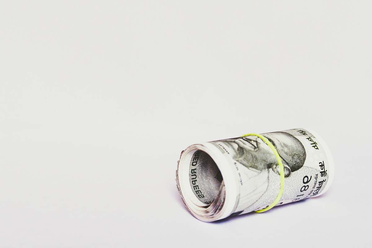 text Indian rupee banknote profit