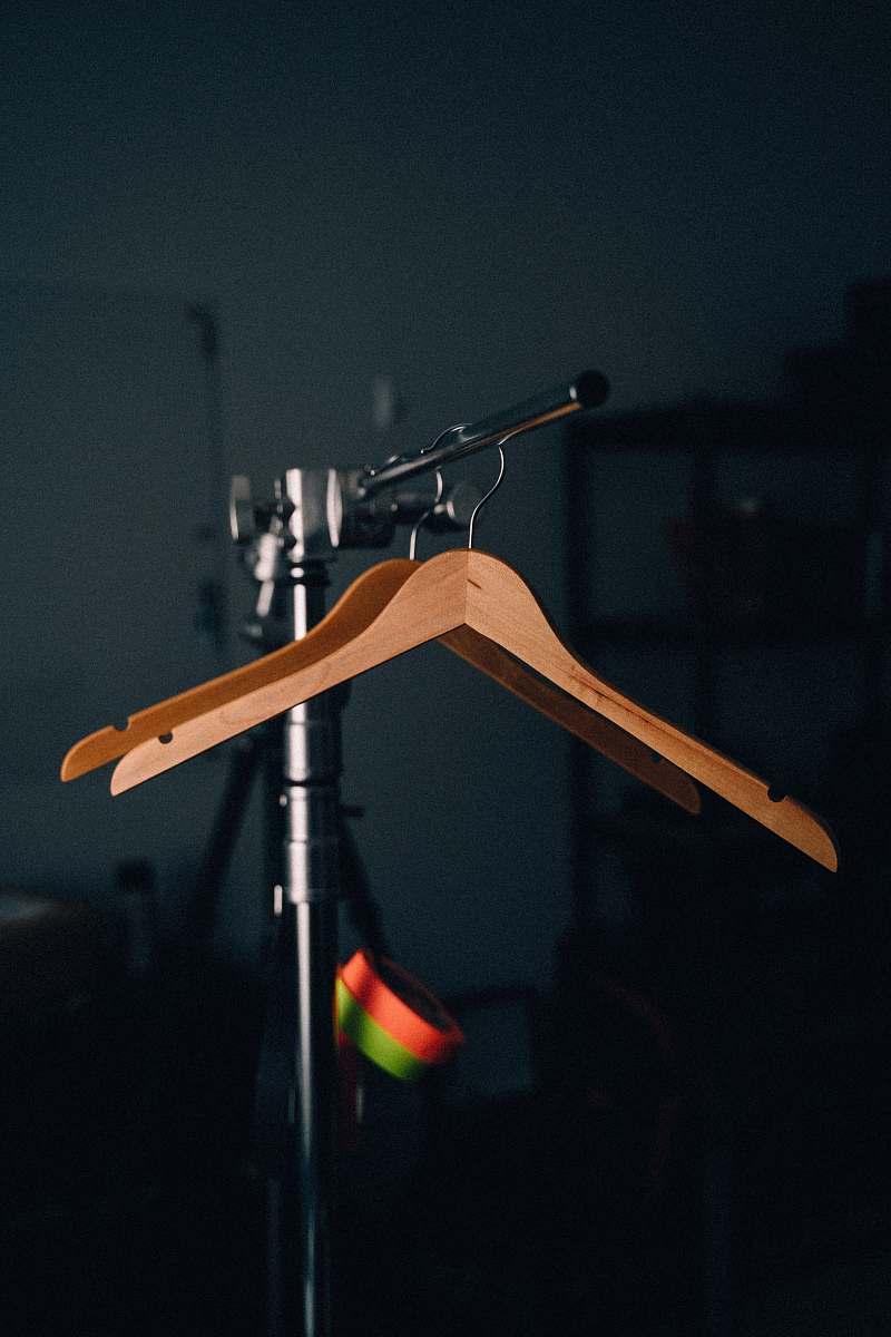scene clothes hangers on display stand man