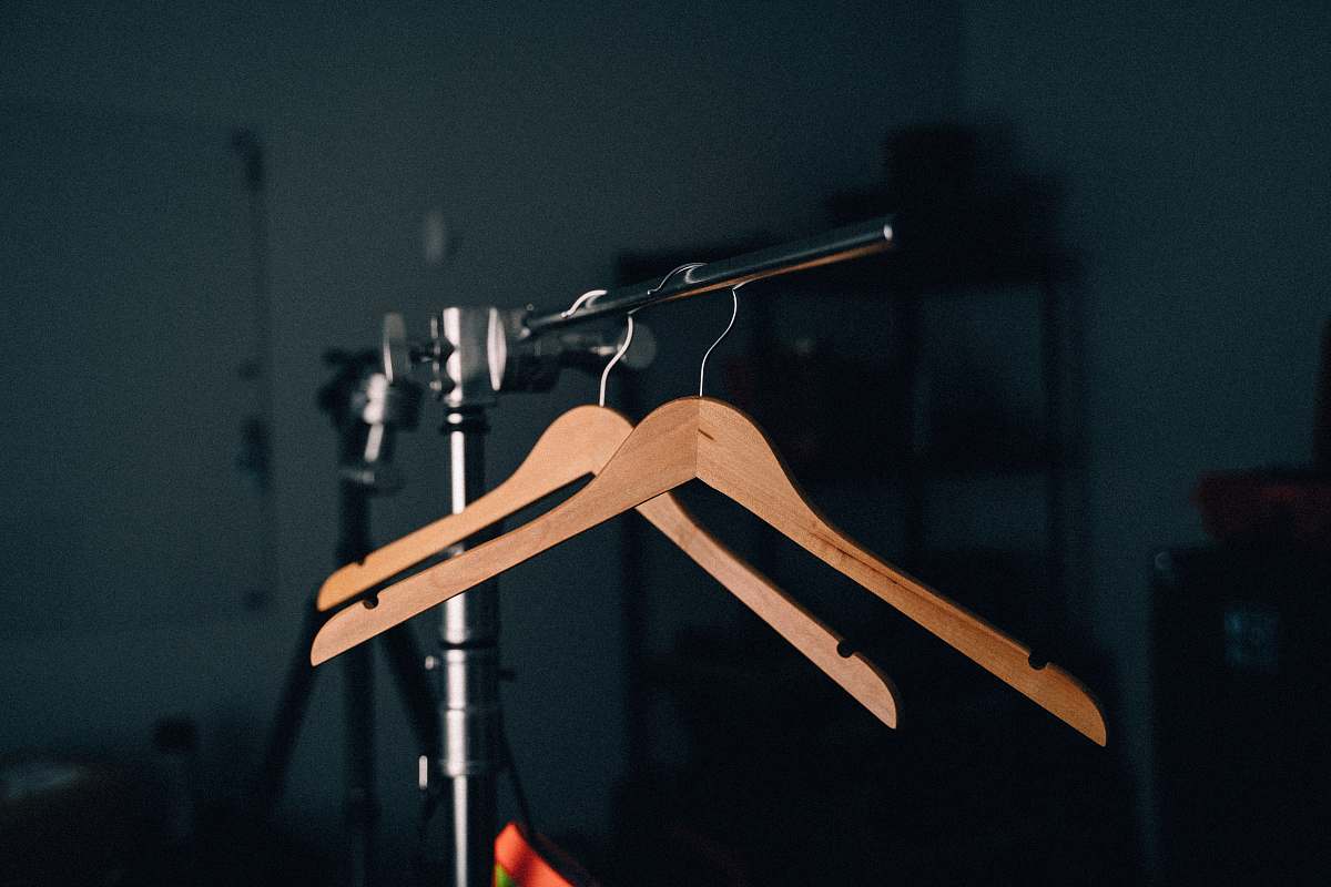 background two brown clothes hangers art
