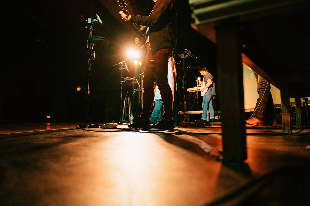 person band on stage at night musician