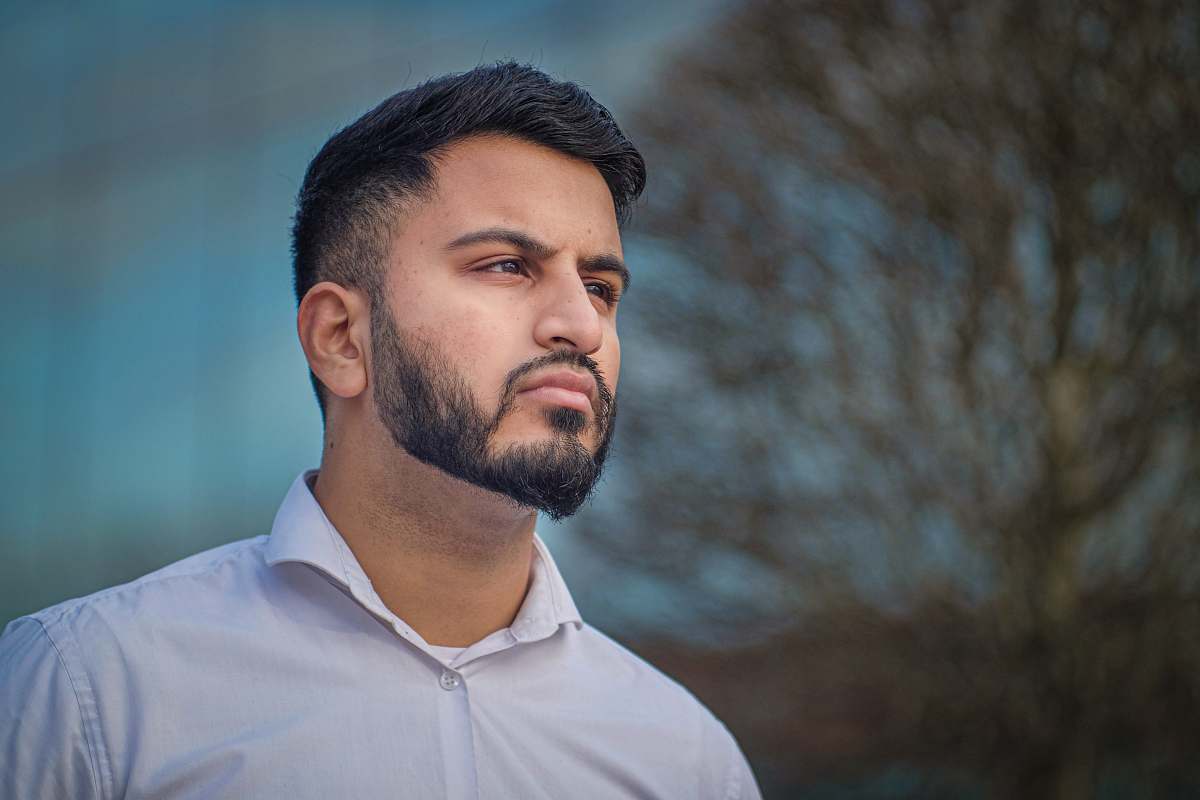 face man in white collared top person
