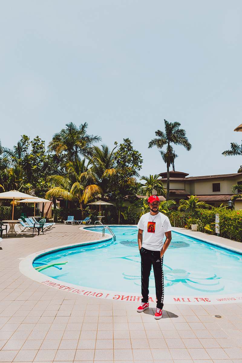 apparel man standing near pool person