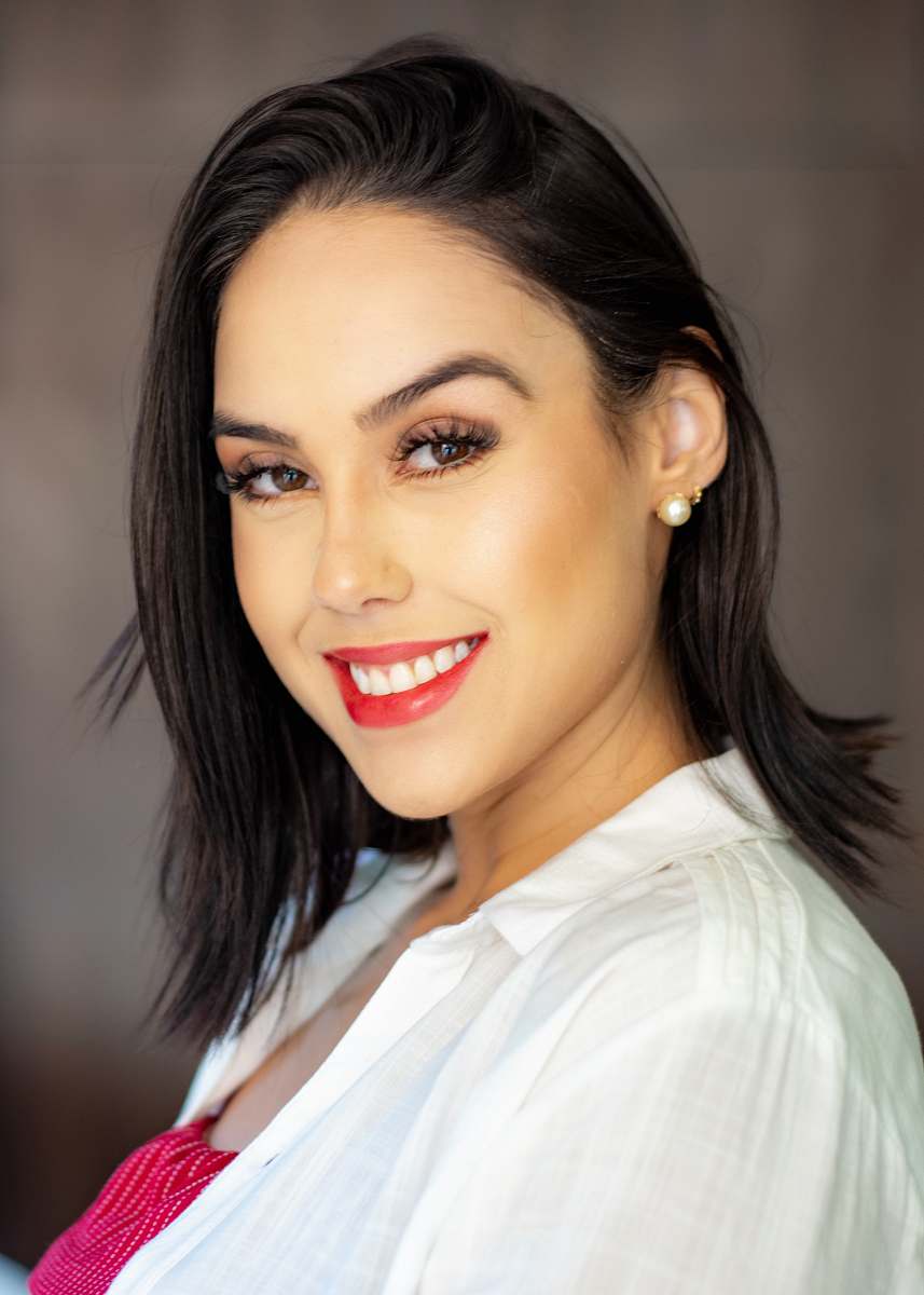 person smiling woman in white collared shirt face