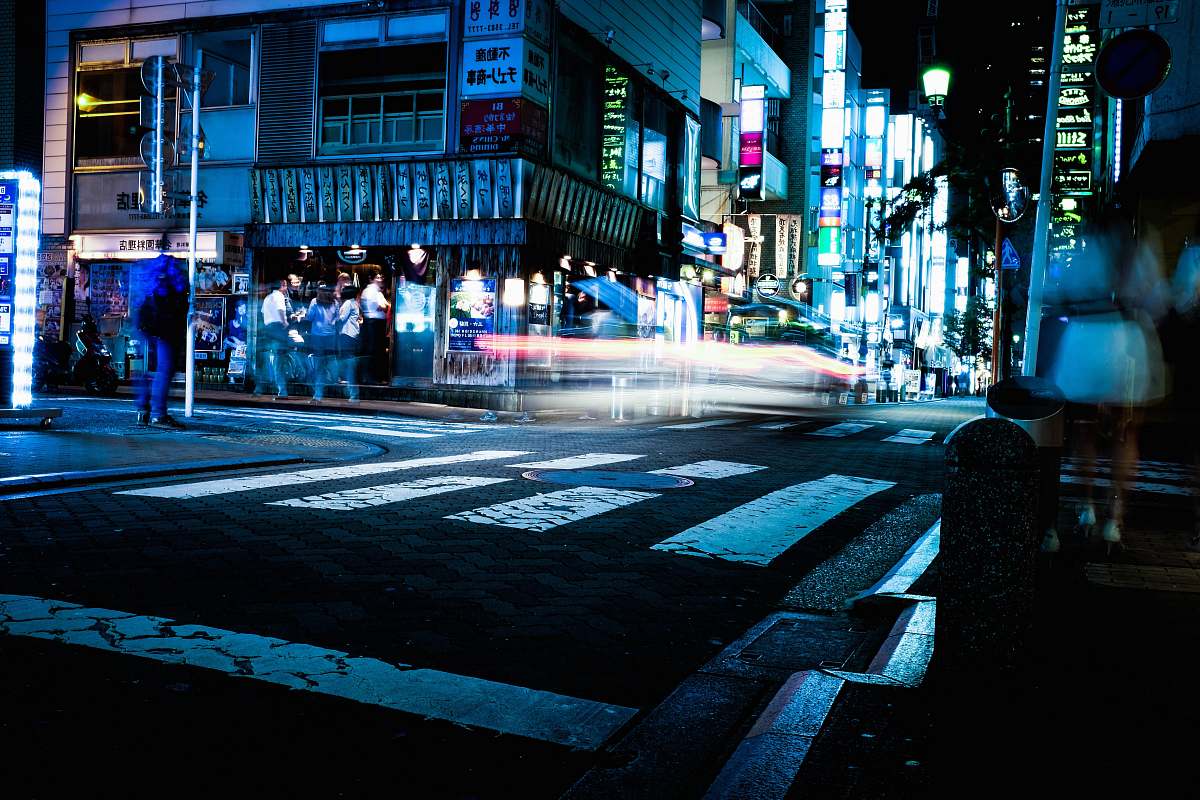 night time lapse photography of cars person