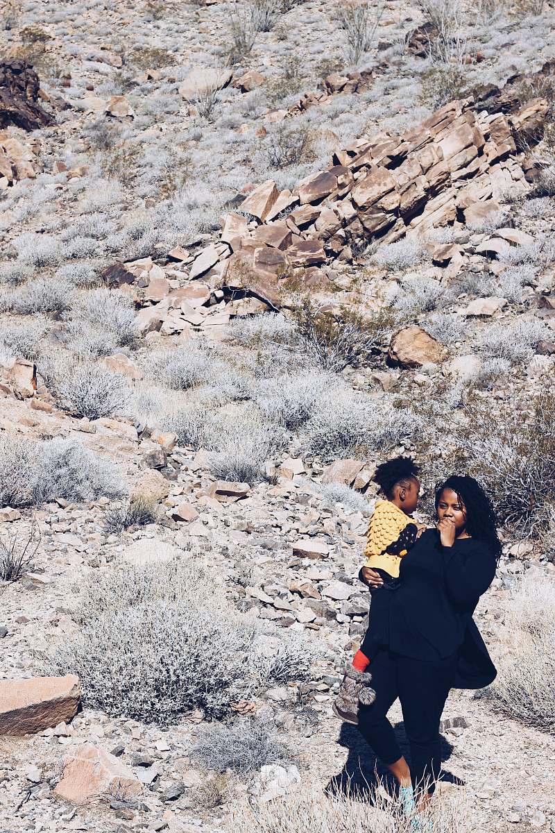 person woman carrying girl clothing