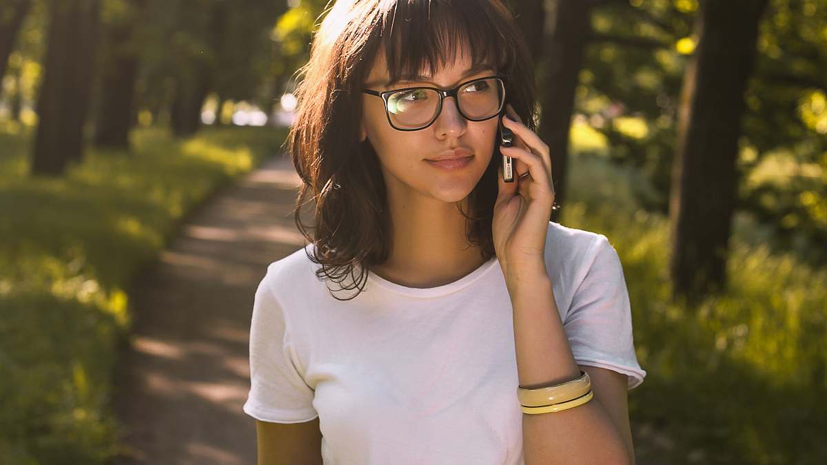 person woman taking on phone accessories